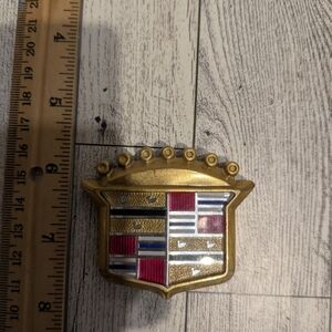 Cadillac Gold and Red Car Emblem